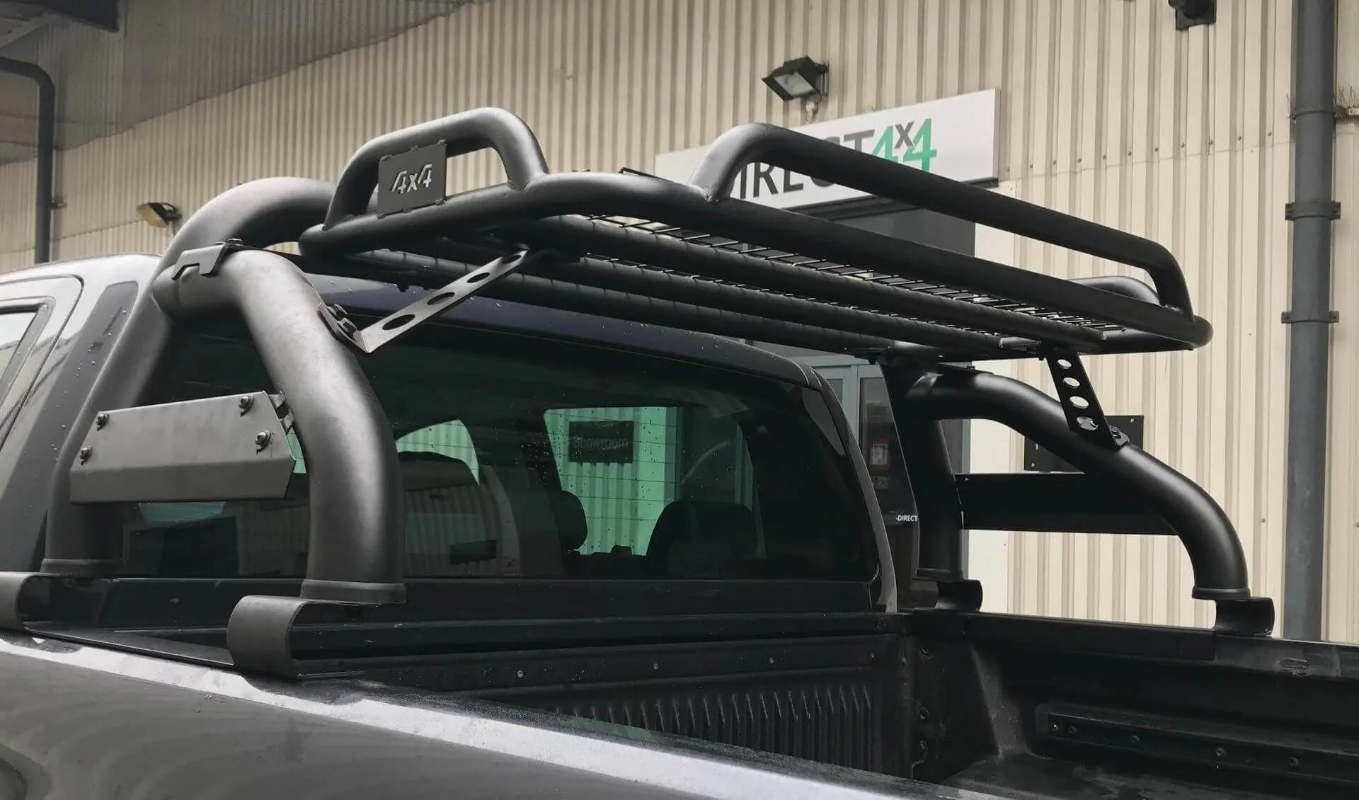 Black SUS201 Short Arm Roll Bar with Cargo Basket Rack for the Ford Ranger 06-12