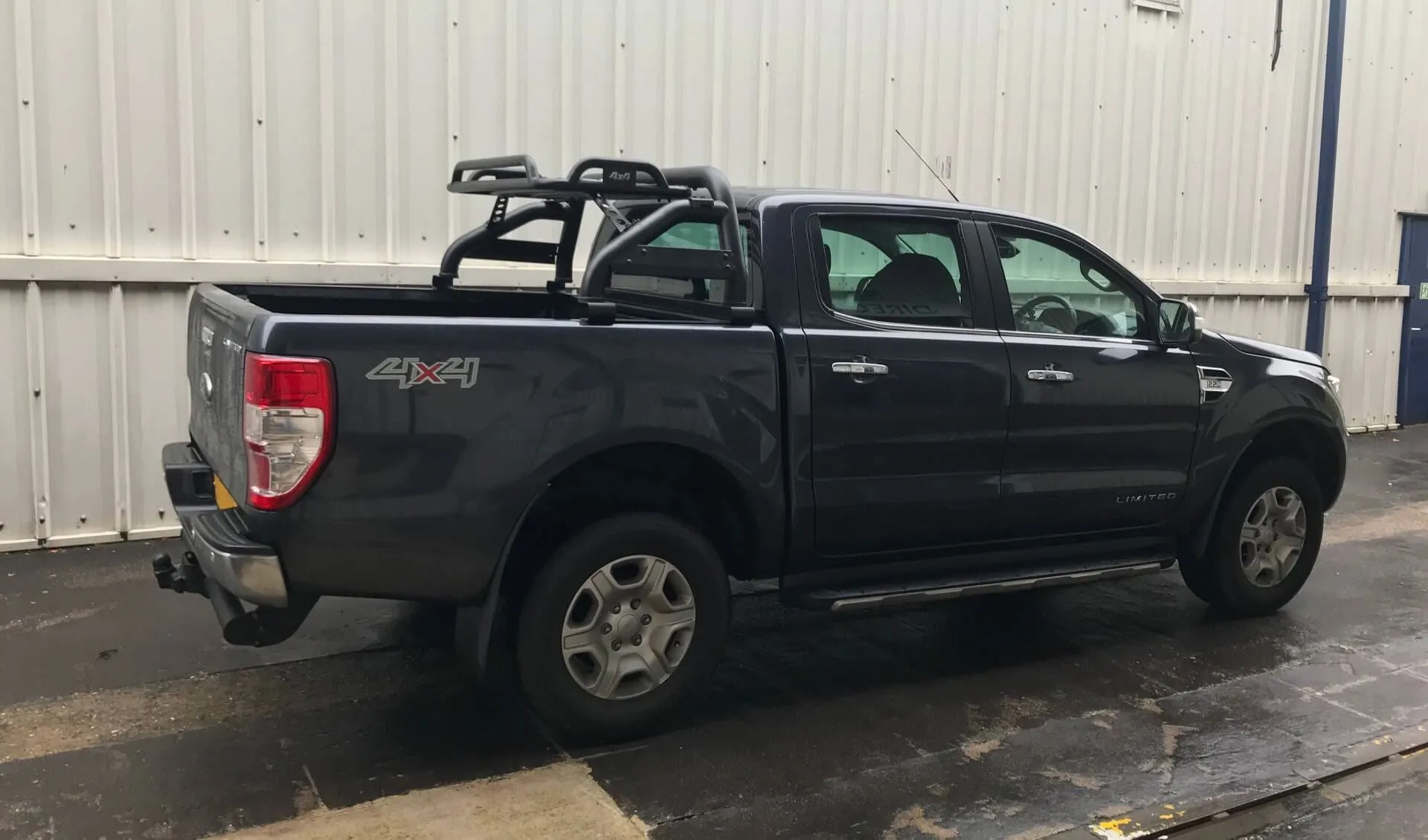 Black SUS201 Short Arm Roll Bar with Cargo Basket Rack for the Ford Ranger 06-12